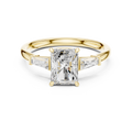Radiant Cut Three-Stone Engagement Ring with Tapered Baguette Side Stones