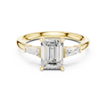 Emerald-Cut Three-Stone Ring with Tapered Baguettes