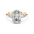 Oval Cut Diamond Three-Stone Ring with Pear Side Stones