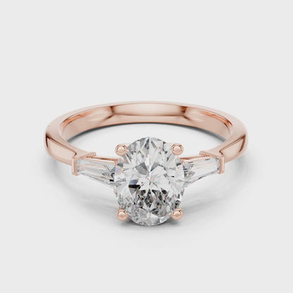 Oval Cut Three-Stone Diamond Ring with Baguettes