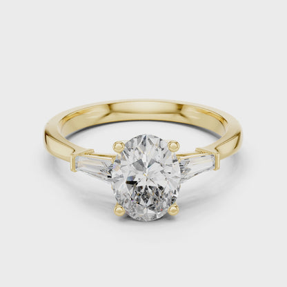 Oval Cut Three-Stone Diamond Ring with Baguettes