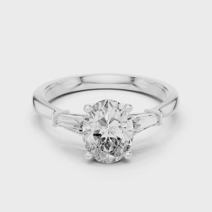 Oval Cut Three-Stone Diamond Ring with Baguettes