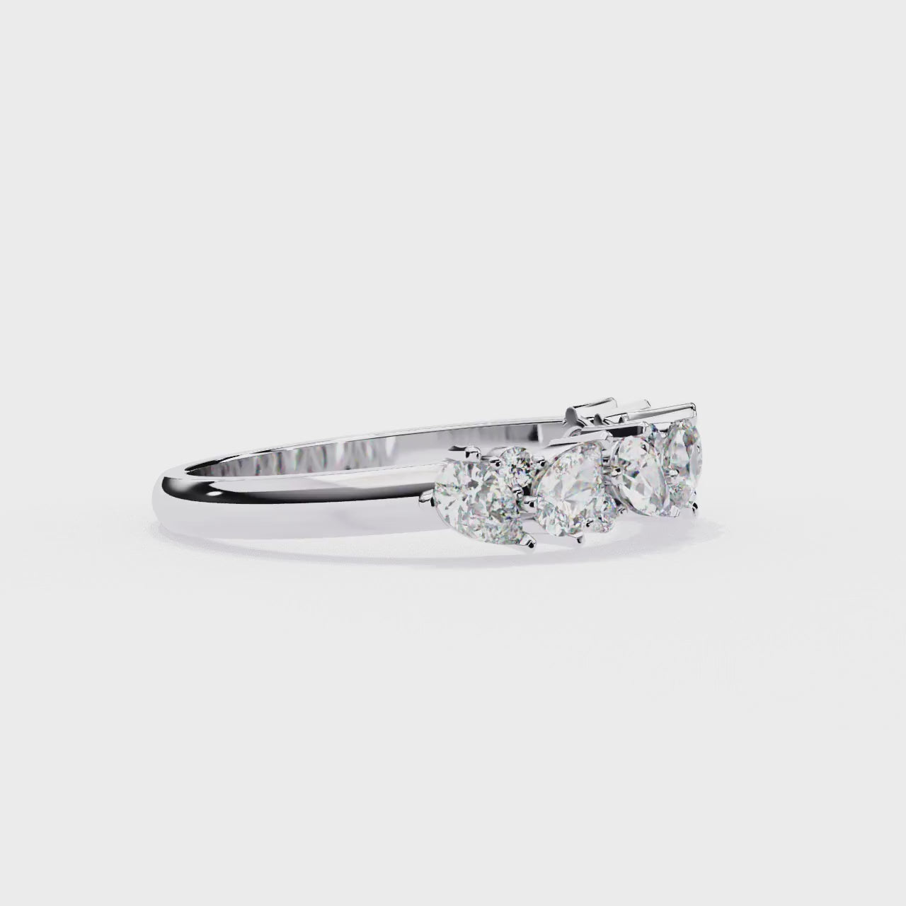 Pear and Round Diamond Band
White Glod
